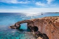 Beautiful natural rock arch near of Ayia Napa, Cavo Greco and Protaras on Cyprus island, Mediterranean Sea. Legendary bridge Royalty Free Stock Photo