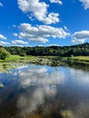 Beautiful natural scenery of river and blue sky in Moscow region, Russia. Summer landscape. Royalty Free Stock Photo