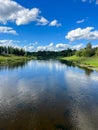 Beautiful natural scenery of river and blue sky in Moscow region, Russia. Summer landscape. Royalty Free Stock Photo