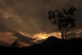 Beautiful natural scenery at sunset behind a hill.