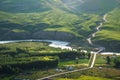 Beautiful natural scenic of alpine meadows with snakelike road Royalty Free Stock Photo