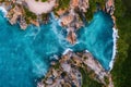 Aerial view Top down seashore big wave crashing on rock cliff