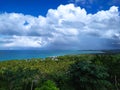 A natural and tropical landscape with beach and clouds. Paisaje natural tropical con playa y nubes Royalty Free Stock Photo