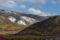 The beautiful nature of the Altai Mountains. View of the snow-covered hills Royalty Free Stock Photo