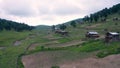 Beautiful nature with country cottages and traditional wooden houses in Lodidziri on the road through the Goderdzi Pass