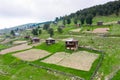 Beautiful nature with country cottages and traditional wooden houses on the road through the Goderdzi Pass in Georgia