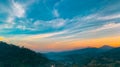 Beautiful nature landscape of mountain range with sunset sky and clouds. Rural village in mountain valley in Thailand. Scenery Royalty Free Stock Photo