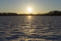 Beautiful nature and landscape photo of sunset at lake with snow and ice in Sweden Royalty Free Stock Photo