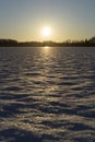 Beautiful nature and landscape photo of sunset at lake with snow and ice in Sweden Royalty Free Stock Photo