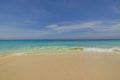 Beautiful nature landscape view of sand beach turquoise water Atlantic ocean surface merging with blue sky. Royalty Free Stock Photo