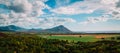 Nature of Mauritius, landscape with mountains and fields, panorama