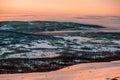 Breathtaking sunset, amazing sky, clouds, dreaming and skiing, relaxing on top of the mountain.