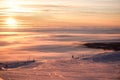 Breathtaking sunset, amazing sky, clouds, dreaming and skiing, relaxing on top of the mountain.