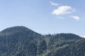 The beautiful nature outdoor landscape in the countryside in Eastern Europe countries. View of Carpathian Mountains against a blue