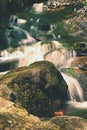 Beautiful nature with a river of rocks and forest. Outdoor colorful background with water. Royalty Free Stock Photo