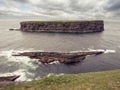 Beautiful nature scene with cliffs and ocean. Kilkee, county Clare, Ireland. Stunning Irish landscape. Dramatic cloudy sky Royalty Free Stock Photo