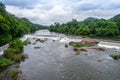 Beautiful nature view during Mansoon time with full filled water fall and green forest from the famous tourist place in Kerala, Royalty Free Stock Photo