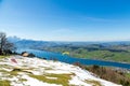 Beautiful nature view in the Swiss Alps with paraplane flying over the lake