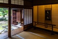 Beautiful neat wooden room with the trees visible through the open door in Takayama Jinya, Japan