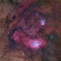 Beautiful nebulae in rich Milky way star field in the constellation Sagittarius including M8 the Lagoon nebula, M20 the Triffid ne Royalty Free Stock Photo