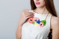 Beautiful necklace bizhueriya of flowers around the neck of a beautiful elegant girl