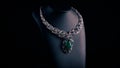 Beautiful necklace with blue sapphires and green emeralds on a black mannequin. Video. Close up of an expensive pendant