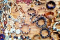 Beautiful necklaces and beads made of wood are sold at the tourist market Royalty Free Stock Photo