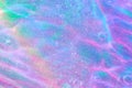 Purple, pink, blue transparent space alien glitter slime gel background texture