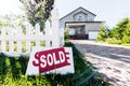 beautiful new house with sign sold standing Royalty Free Stock Photo