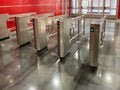 Beautiful new shiny metal automatic turnstiles for entering the subway or exiting the building