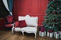 Beautiful New Year decorated classic home interior. Winter background. Living room with a Christmas decor. Holiday background. New