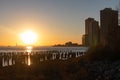 Beautiful New York City Sunset along the East River seen From the Shore of Brooklyn Heights in Silhouette Royalty Free Stock Photo