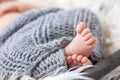 Beautiful newborn baby toes inside a basket