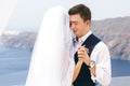 Beautiful newlyweds dancing on sea Royalty Free Stock Photo