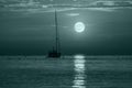 Beautiful night Adriatic sea, yacht and full moon, Croatia. Night seascape. Trendy banner toned in 2021 color Royalty Free Stock Photo