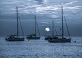 Beautiful night Adriatic sea, yachts and full moon, Croatia. Night seascape