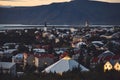 Beautiful night dusk view of Reykjavik, Iceland, aerial view with Hallgrimskirkja lutheran church, with scenery beyond the city, Royalty Free Stock Photo