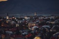 Beautiful night dusk view of Reykjavik, Iceland, aerial view with Hallgrimskirkja lutheran church, with scenery beyond the city, Royalty Free Stock Photo