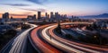 Beautiful night highway entering a big sity fast traffic aerial drone shot during picturesque sunset evening light. Never ending Royalty Free Stock Photo