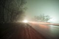 Beautiful night landscape of foggy road in a dark forest after rain. Azerbaijan Royalty Free Stock Photo