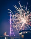 Beautiful night landscape with salute and fireworks by captal Tv tower on Mtantsminda hill in Tbilisi city Royalty Free Stock Photo