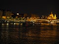 A beautiful night panorama of Budapest the capital of Hungary with Danube river and illuminated bridge and Parliament Royalty Free Stock Photo