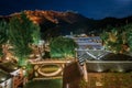 Beautiful night scenery at Gubei Water Town & Simatai Great Wall in the background - China