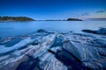 Blue moment in the rocky seashore Royalty Free Stock Photo