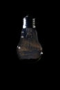 Beautiful night sky inside of light bulb on dark background