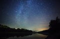 Beautiful night sky, the Milky Way, star trails and the trees Royalty Free Stock Photo