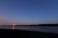 Beautiful night sky with moon and constellation over Danube river