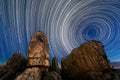 A beautiful night sky photograph with moving circular star trails