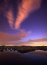 Beautiful night sky at the river with stars and clouds Royalty Free Stock Photo