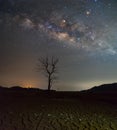 Beautiful Night Starry sky with Rising Milky Way over the dead t